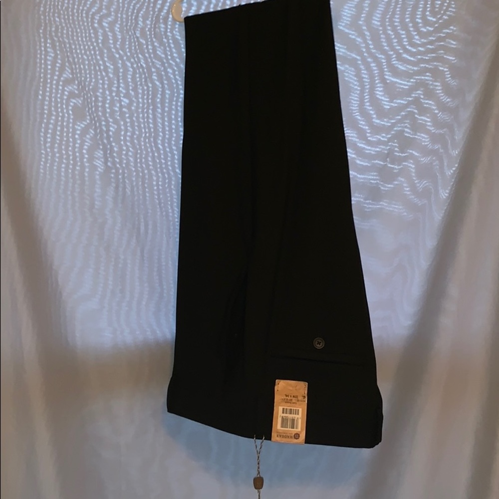 Men’s black dress pants.